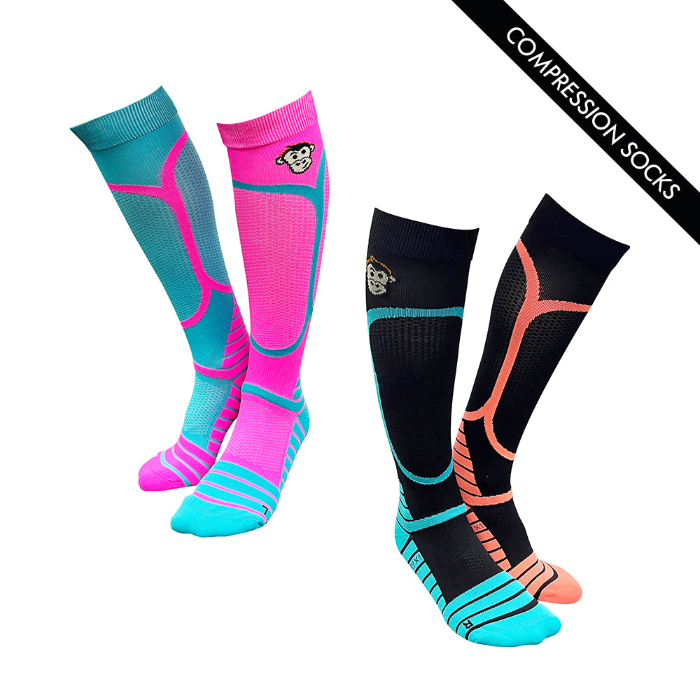 Compression socks for running and recovery. Bundle of 2 pairs.  One pair is pink with turquoise, the other pair is black with orange and blue details around the foot and calf muscles.